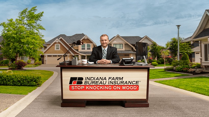 Ron Kempf at the Stop Knocking on Wood Desk