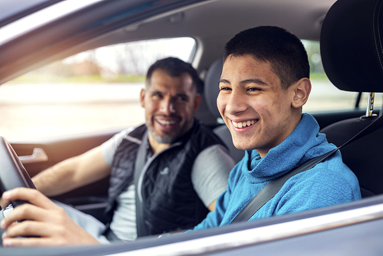 How much does it cost to add a driver to car insurance in Indiana an image of a father an son driving who is a new driver