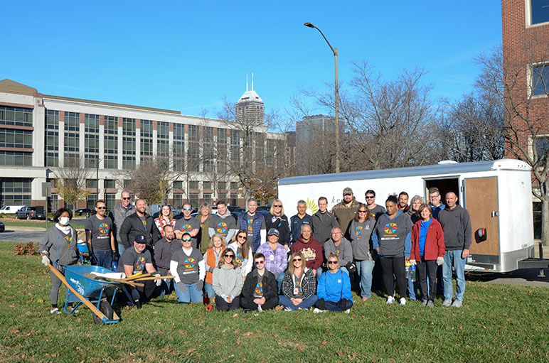 Indiana Farm Bureau Insurance employees and agents smiling for a photo with Keeping Indianapolis Beautiful (KIB)