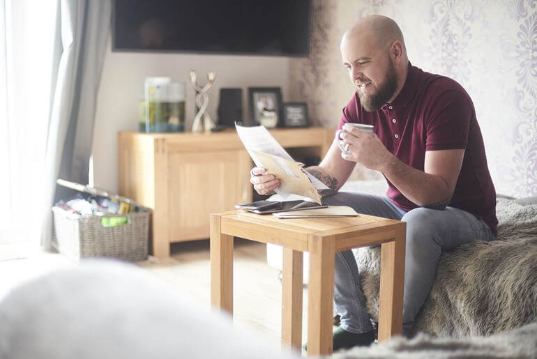 smiling guy on couch