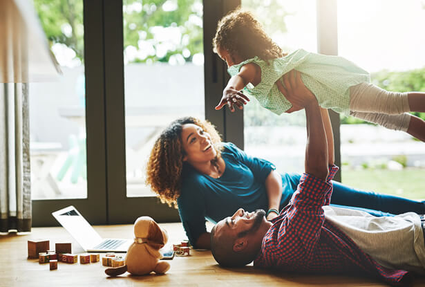 family playing on floor